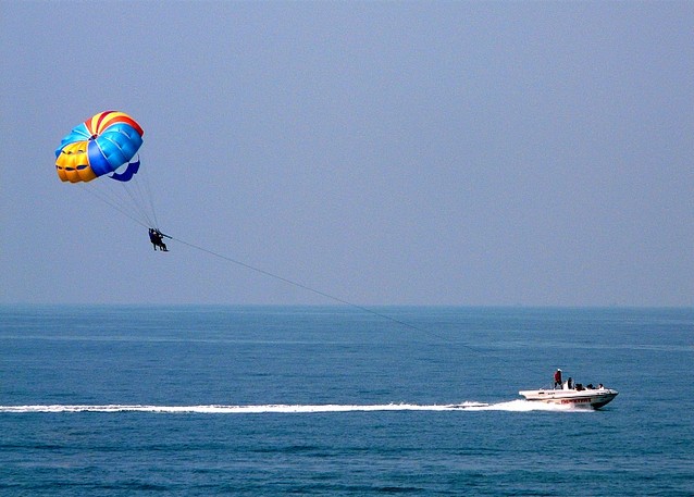 Parasailing is a water sport commonly indulged in beaches and sea side resorts
