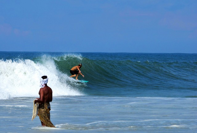 Surfing is becoming popular adventure activity in Varkala India