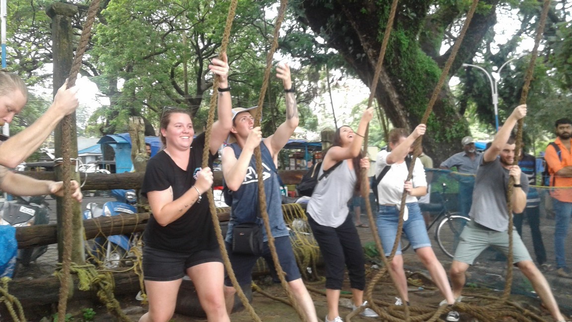 Catching some fish and Pulling up the Chinese Fishing Nets,Cochin,India — in Fort Cochin.