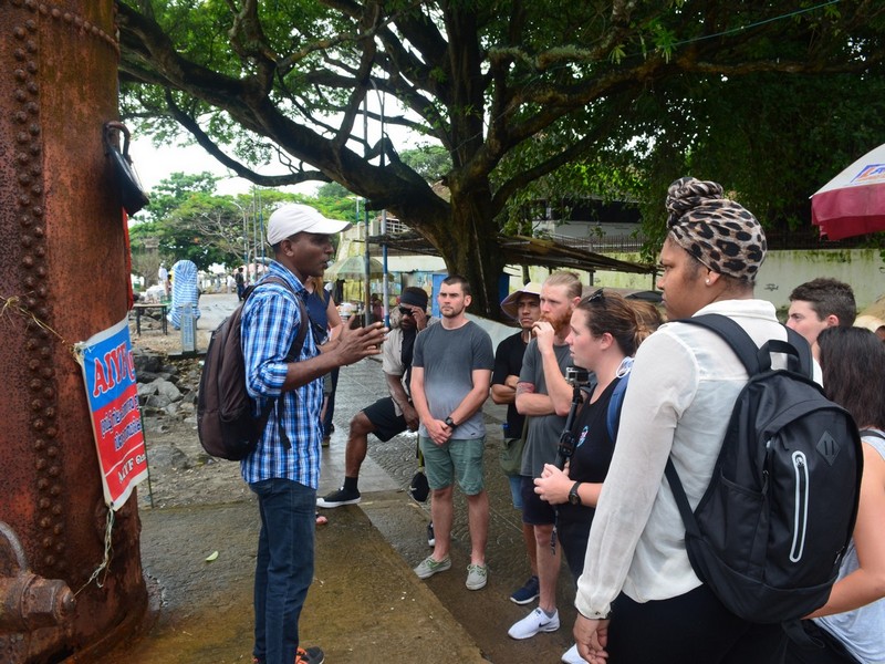 Iris Holidays guide explaining about these two tall, rusted drums were once boilers on a ship that pushed a ship across the ocean. 