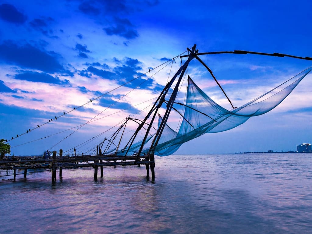 Chinese Fishing Net Poles in the Backwaters of Kerala, India Stock