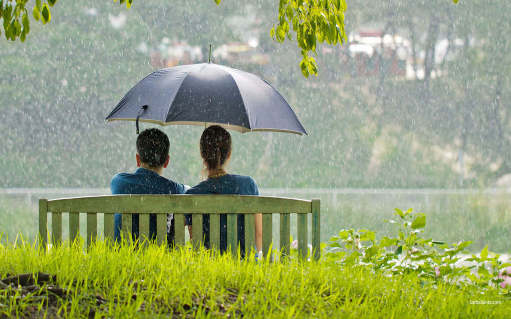 couple in rain in Kerala