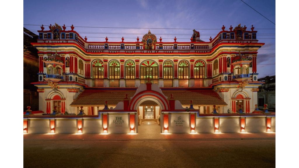 Grand exterior of Kanadukathan Palace showcasing traditional Chettinad architecture